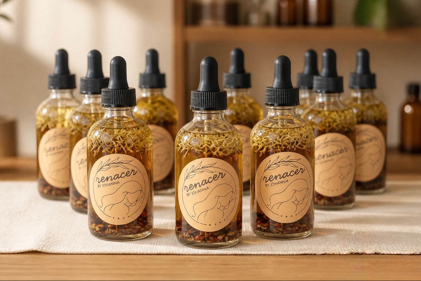 Row of Renacer tincture bottles on a wooden surface with a blurred indoor background.